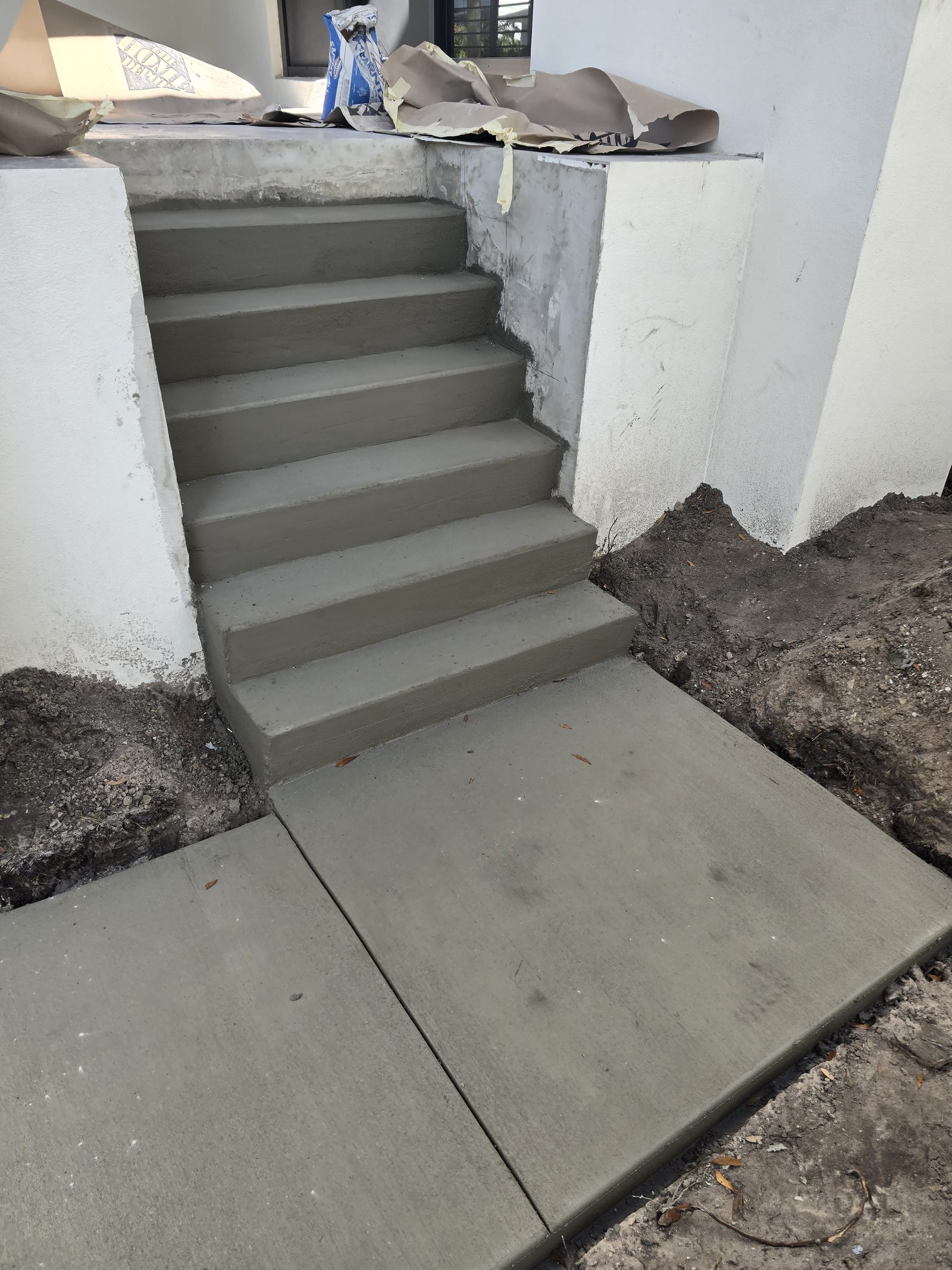 Poured concrete stairs and landing